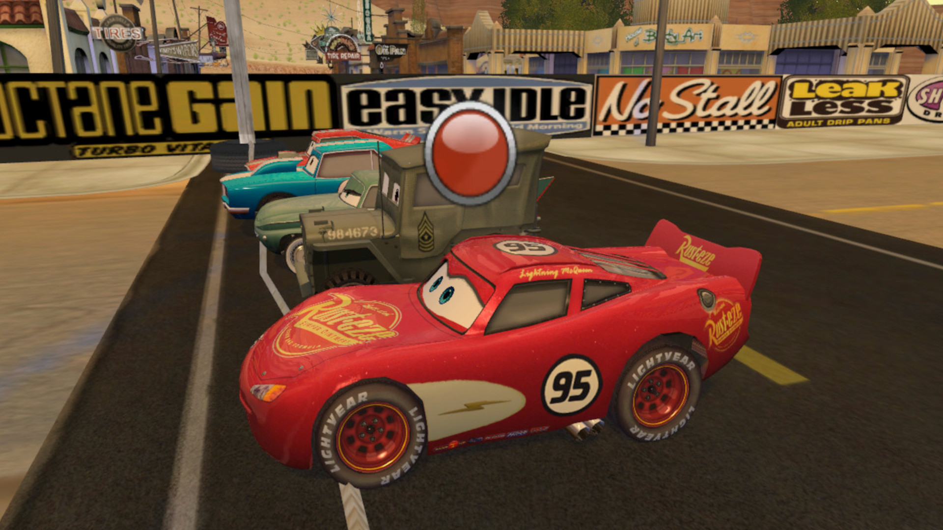 CARS car characters lined up getting to race in the desert.