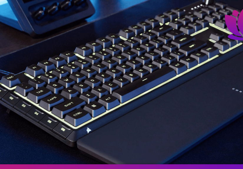 Skiff 100 Corsair keyboard shown on a dark desk with blue lights.